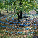 Stone spiral with chair at Damanhur